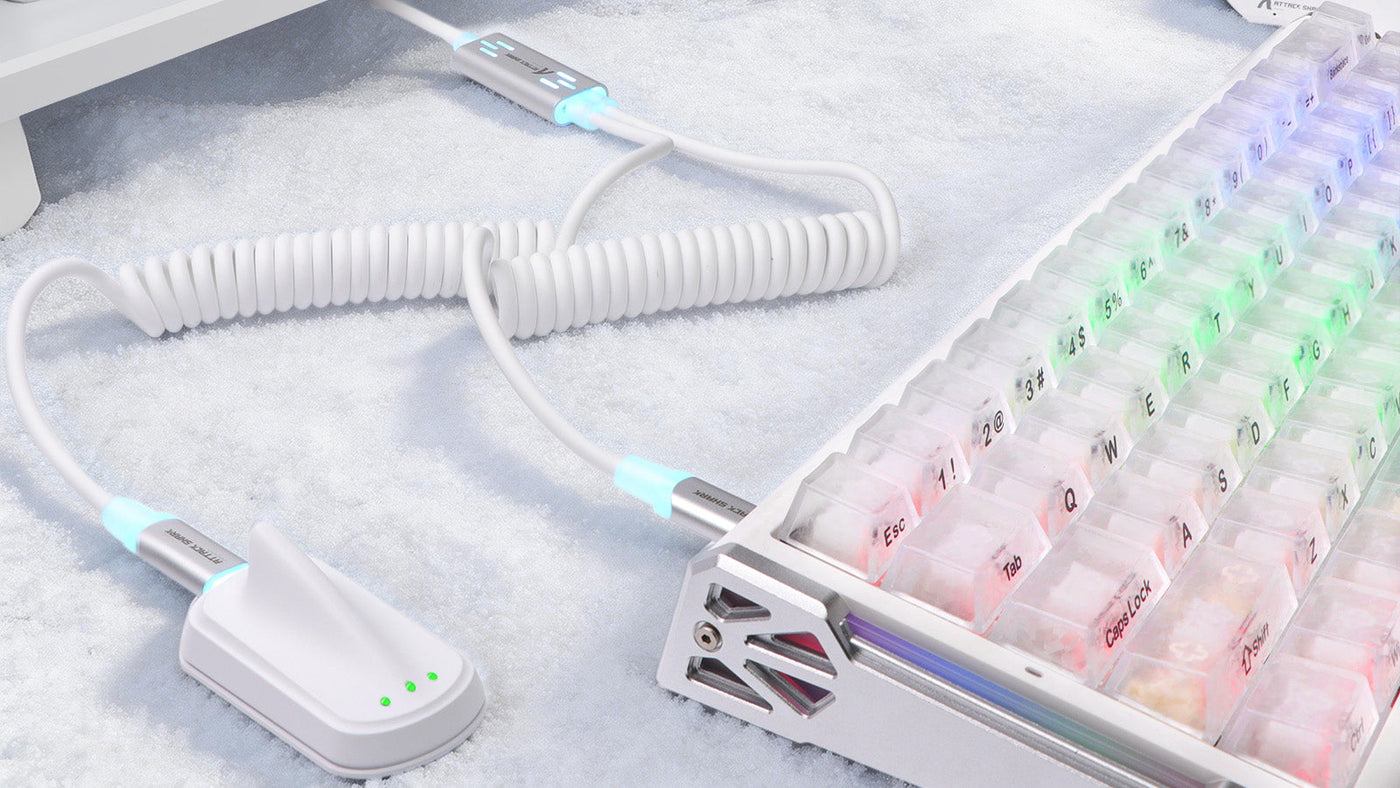 White illuminated keyboard cable connected to a transparent mechanical keyboard