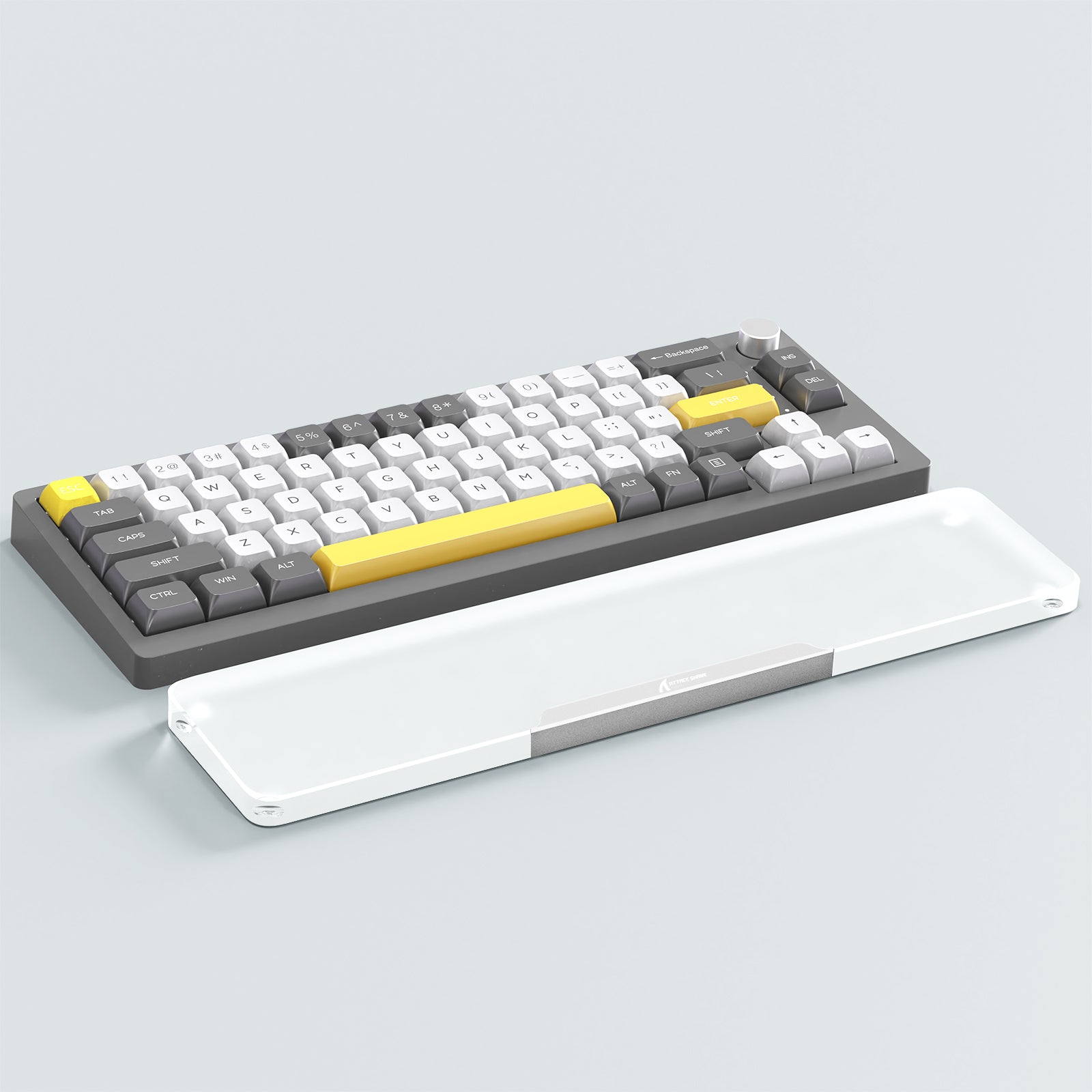 87-key mechanical keyboard with gray and yellow keycaps and a translucent acrylic wrist rest