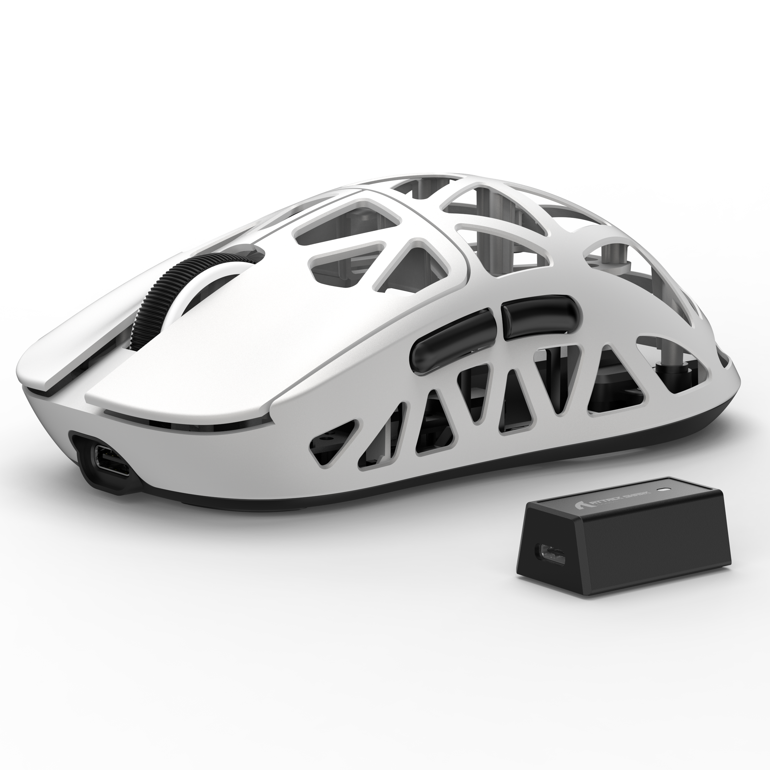 White Attack Shark R2 gaming mouse with hollow design and USB-C charging dock.